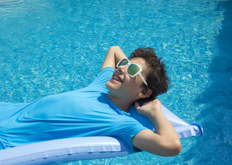 Hppy boy in the swimming pool