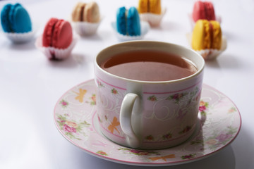 multicolored macaroon and tea