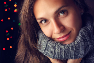 Portrait of beautiful young smiling girl on the background of th © mizinra