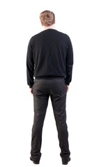 back view of Business man  looks ahead. Young guy in sweater watching.  Rear view people collection.  backside view of person.  Isolated over white background. office worker with his hands down looks