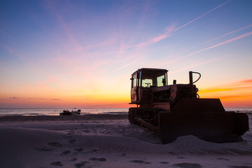 Fototapeta na wymiar Fishing boat transporter at sunset