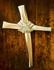 This Palm Branch was folded into a Cross shape and photographed on an antique wooden seat.  It represents the Easter Season including Palm Sunday and Good Friday. Palm Branch Cross is my creation.
