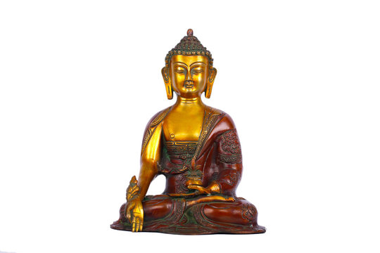 copper statue of a seated Buddha isolated on white background