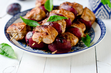 Chicken, turkey kebabs with plums