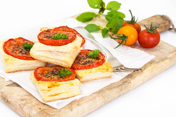 Fototapeta na wymiar Mini Pizzas, Pies with Tomato and Oregano