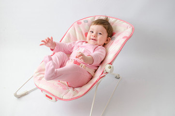 baby girl on a bouncer