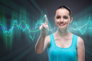 Woman in sports concept monitoring heart rate