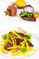 Salad of Yellow Beets with Red Onion and Beef Jerky