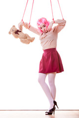 woman girl stylized like marionette puppet on string