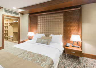 Modern hotel room with big bed