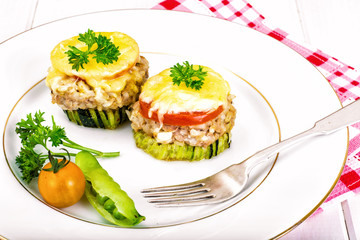 Zucchini with Tuna, Rice, Cheese and Tomato on Barbecue Grill