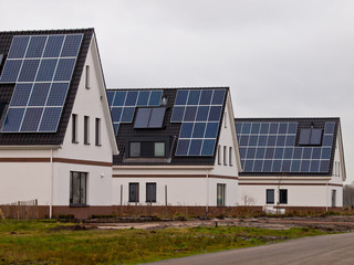 Fototapeta premium New Houses with Solar Panels in a Street