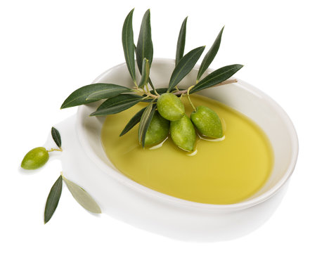 Branch with olives in olive oil