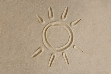 Sonne abstrakt in Sand gezeichnet