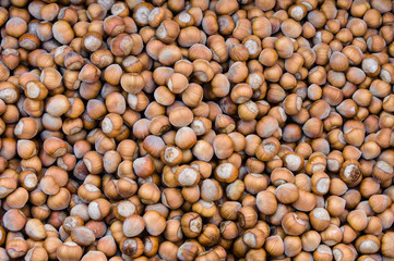 Bulk display of dry hazelnuts at the market