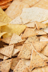 Heap of salted crisps and cookies, concept of unhealthy food