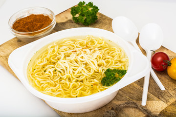 Chicken Soup with Noodles in Plastic Disposable Tableware