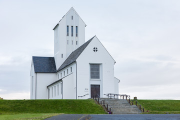 Fototapeta na wymiar SKALHOLT, ICELAND - JULY 24: The modern Skalholt cathedral was completed in 1963, is pictured on July 24, 2016 and is situated on one of Iceland's most historic sites.