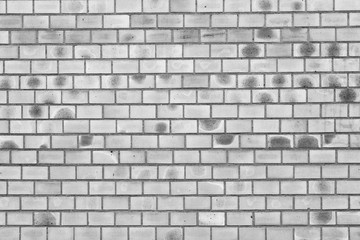 Fototapeta premium Brick texture with scratches and cracks