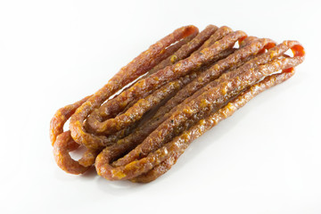 Delicious kabanossi on a white background