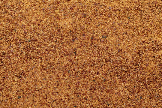 Organic powder of Indian Jujube (Ziziphus mauritiana). Macro close up background texture. Top view.