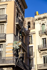 Fototapeta na wymiar Barcelona. Chinese dragon on House of Umbrellas (Casa Bruno Cuad