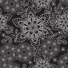 Seamless pattern with doodles elements for design. black and white flowers, leaves