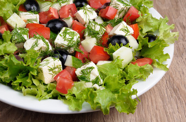 Vegetable salad with feta and olives