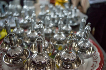 Naklejka premium Silver gourds filled with holy water, for use in Buddhist ceremonies.