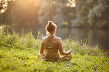 Woman Yoga exercises outdoor