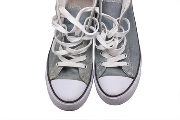 Gray worn sneakers.