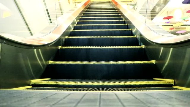 moving escalator down, mecanic, electic, Stair and escalators in a public area. hd footage 1080
