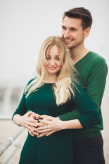 Happy couple on the pier, young family in love spending honeymoon vacation luxury islands