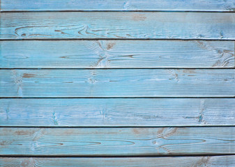 Obraz premium Old wooden fence. blue wood palisade background.