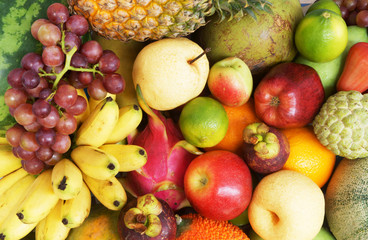 Many fresh fruits mixed, fruits background
