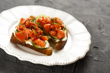 Sandwich with salmon and cucumber