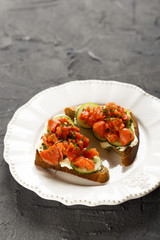 Sandwich with salmon and cucumber