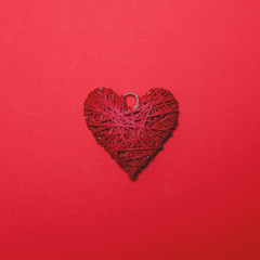 Branch made heart on red background - Minimal design