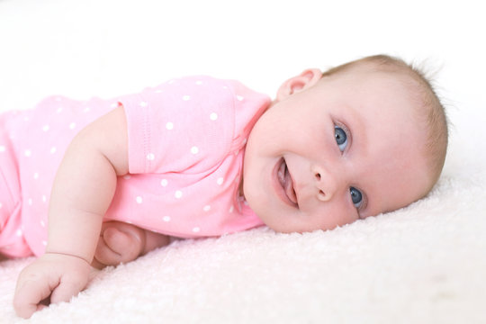Portrait of happy smiling 2 months baby girl