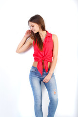 Young cheerful girl having fun in a studio.