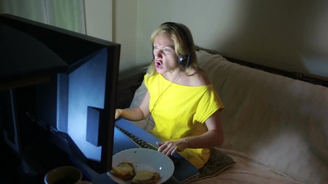 adult woman playing video games on your computer. rabid gamer. I lost the game