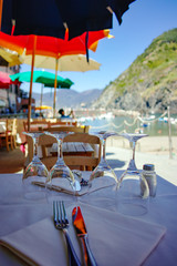 Beach cafe, table served for dinner