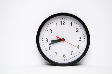 Black clock isolated on white background