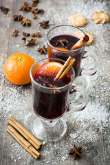 Christmas mulled wine on wooden table

