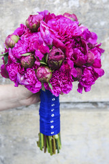 Wedding bouquet with peonies and carnations