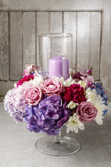 Floral arrangement with roses, peonies and hortensias.