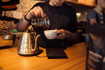 Barista at work in a coffee shop