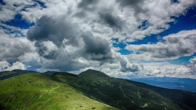 Summer landscape in mountains and blue sky with clouds. Timelapse. Carpathians