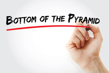 Hand writing Bottom of the Pyramid with marker, concept background