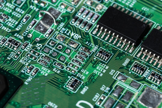 Close up of a printed green computer circuit board